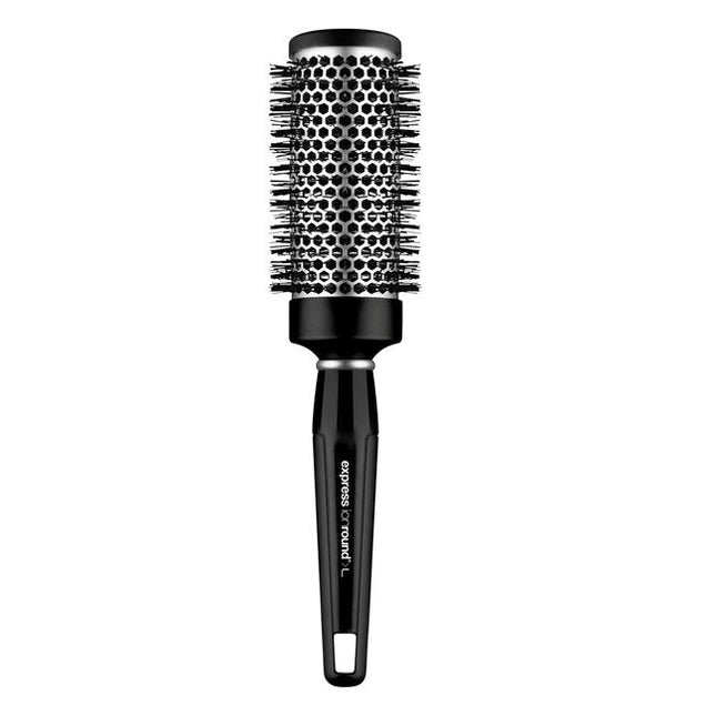 Express Ionic Round Brush minimizes flyways and creates a sleek, frizz-free finish. Aluminum barrel heats up during blow-drying to help shape your style.