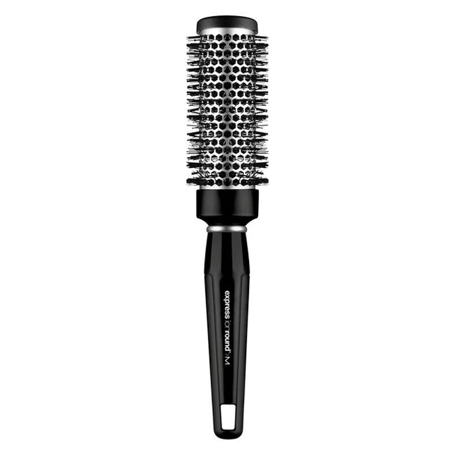 Express Ionic Round Brush minimizes flyways and creates a sleek, frizz-free finish. Aluminum barrel heats up during blow-drying to help shape your style.