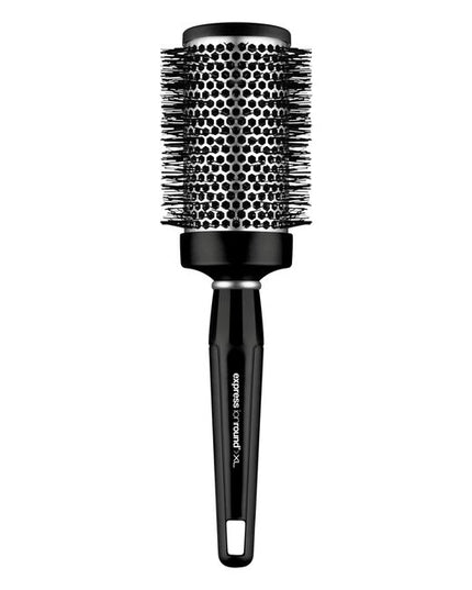 Express Ionic Round Brush minimizes flyways and creates a sleek, frizz-free finish. Aluminum barrel heats up during blow-drying to help shape your style.