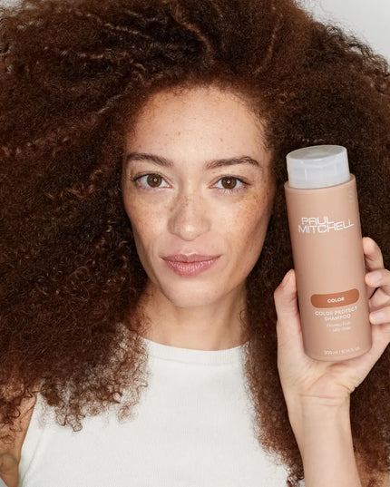 Color Protect Shampoo
Prevents Fade + Adds Shine

Ideal for color-treated hair. Sunflower extract helps prevent sun damage and extend the life of hair color. Imparts beautiful shine for vibrant, healthy-looking strands.