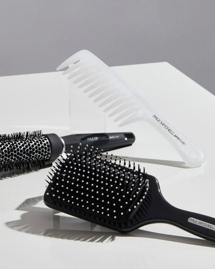 Wide-tooth comb with antimicrobial properties easily detangles wet or dry hair.