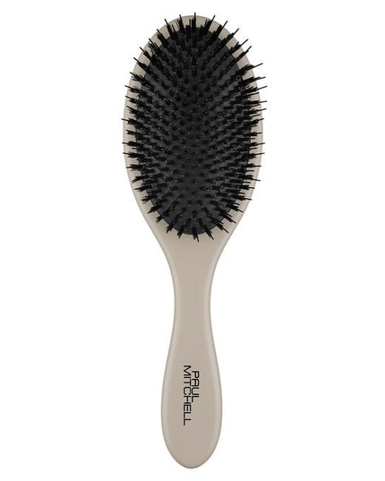PAUL MITCHELL DRESSING BRUSH
All Dressed Up and Ready to Go
Minimize frizz and polish your look with this lightweight brush. Flexible nylon and vegan boar bristles help tame frizz and distribute scalp oils to enhance natural shine.