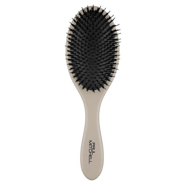 PAUL MITCHELL DRESSING BRUSH
All Dressed Up and Ready to Go
Minimize frizz and polish your look with this lightweight brush. Flexible nylon and vegan boar bristles help tame frizz and distribute scalp oils to enhance natural shine.