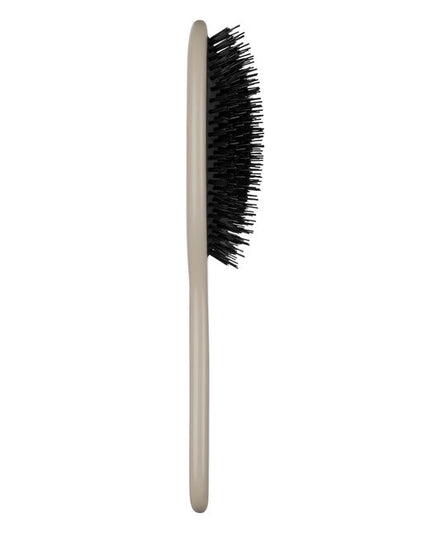 PAUL MITCHELL DRESSING BRUSH
All Dressed Up and Ready to Go
Minimize frizz and polish your look with this lightweight brush. Flexible nylon and vegan boar bristles help tame frizz and distribute scalp oils to enhance natural shine.