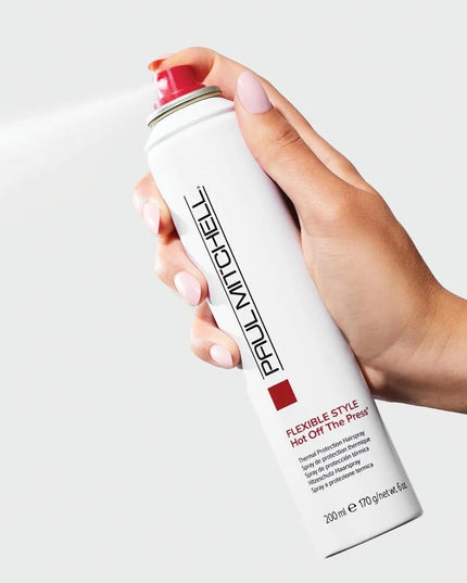 Turn up the heat with this quick-drying thermal protection hairspray that helps protect strands when using curling irons and flat irons. It contains rice hull extract that builds a lightweight barrier between hair and heat styling tools, while wheat proteins boost hair's strength. The flexible-hold, humidity-resistant frizz-fighting formula is the perfect finishing touch for any style—curly or straight.