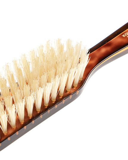 The Koh-I-Noor Rectangular Hair Brush with Natural Bristles is a sleek and sophisticated grooming tool. Hand-crafted in Italy, it features five rows of firm natural bristles that will condition your hair and stimulate your scalp. Part of the Jaspè collection, its faux tortoise handle is designed for comfort. Hand-crafted with the finest materials in Italy.