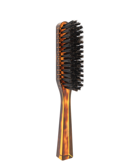 The Koh-I-Noor Rectangular Hair Brush with Natural Bristles is a sleek and sophisticated grooming tool. Hand-crafted in Italy, it features five rows of firm natural bristles that will condition your hair and stimulate your scalp. Part of the Jaspè collection, its faux tortoise handle is designed for comfort. Hand-crafted with the finest materials in Italy.