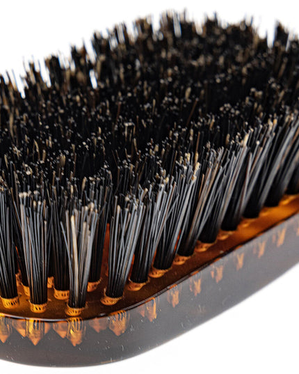 The Koh-I-Noor Wide Rectangular Hair Brush with Natural Bristles is a sophisticated grooming tool. Hand-crafted in Italy, it features firm natural bristles that will condition your hair and stimulate your scalp. It also makes for a terrific beard brush. Part of the Jaspè collection, its faux tortoise handle is designed for comfort. Hand-crafted with the finest materials in Italy.