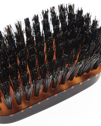 The Koh-I-Noor Wide Rectangular Hair Brush with Natural Bristles is a sophisticated grooming tool. Hand-crafted in Italy, it features firm natural bristles that will condition your hair and stimulate your scalp. It also makes for a terrific beard brush. Part of the Jaspè collection, its faux tortoise handle is designed for comfort. Hand-crafted with the finest materials in Italy.
