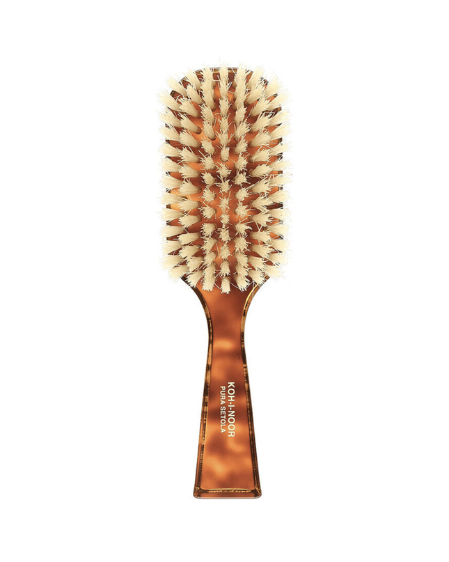 The Koh-I-Noor Wide Rectangular Hair Brush with Natural Bristles is a sophisticated grooming tool. Hand-crafted in Italy, it features firm natural bristles that will condition your hair and stimulate your scalp. It also makes for a terrific beard brush. Part of the Jaspè collection, its faux tortoise handle is designed for comfort. Hand-crafted with the finest materials in Italy.
