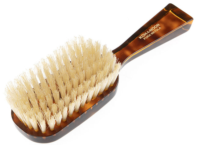 The Koh-I-Noor Wide Rectangular Hair Brush with Natural Bristles is a sophisticated grooming tool. Hand-crafted in Italy, it features firm natural bristles that will condition your hair and stimulate your scalp. It also makes for a terrific beard brush. Part of the Jaspè collection, its faux tortoise handle is designed for comfort. Hand-crafted with the finest materials in Italy.