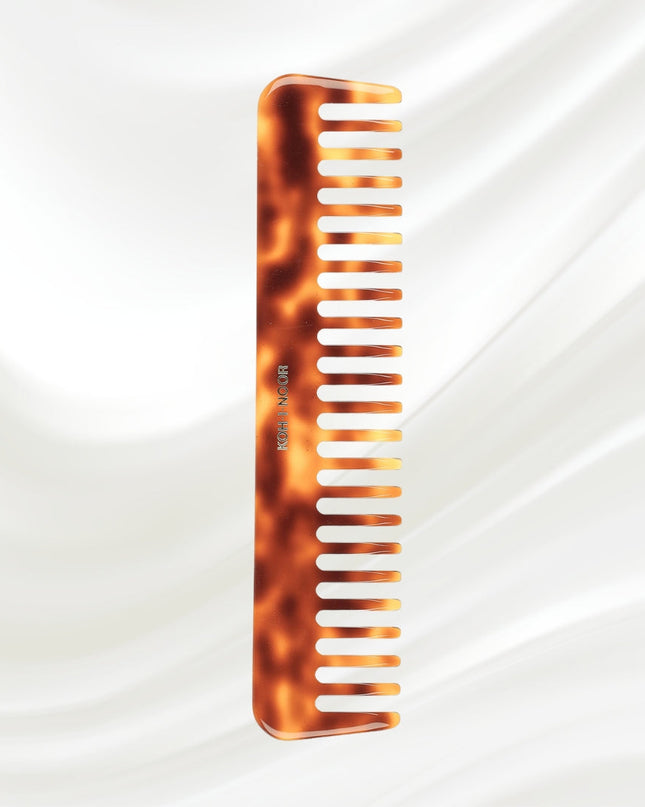 Jaspe Wide Tooth Comb is the perfect implement for detangling wet hair.&nbsp; This beautiful comb will add nicely to your Jaspe brush to make a gorgeous set of your own or to give as a gift.