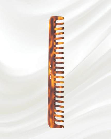 Jaspe Wide Tooth Comb is the perfect implement for detangling wet hair.&nbsp; This beautiful comb will add nicely to your Jaspe brush to make a gorgeous set of your own or to give as a gift.