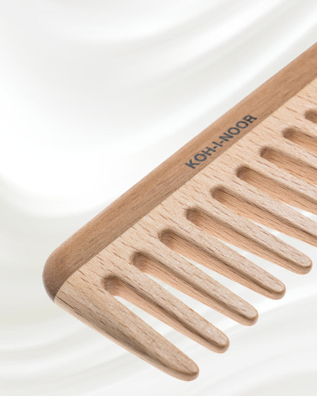 Use this exquisite comb to smooth out coarse and thick hair. Handcrafted, its teeth are expertly carved and refined to help detangle and style hair. Always gentle, this comb is durable and will keep your hair looking its best.