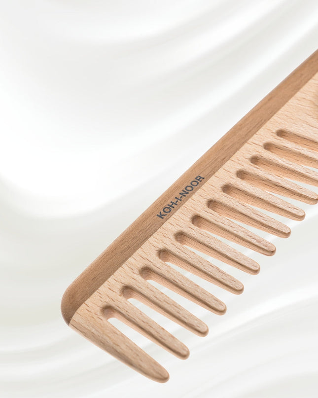Use this exquisite comb to smooth out coarse and thick hair. Handcrafted, its teeth are expertly carved and refined to help detangle and style hair. Always gentle, this comb is durable and will keep your hair looking its best.