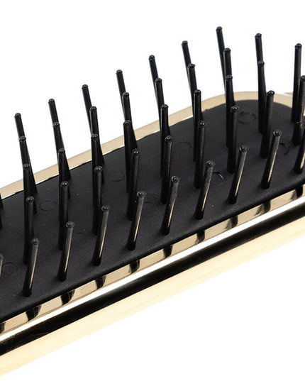 Artfully designed, our Metallic synthetic pin brushes are designed specifically for hair that’s harder to style. Increased control and manageability without damage, each is hand made with a cushioned, pneumatic rubber base. The pneumatic brush design includes cylindrical synthetic pins inserted in a unique rubber cushion pad, perfect for smoothing thick, coarse hair. Made of ABS and coated with either gold or chrome plating. Hand-crafted with the finest materials in Italy.