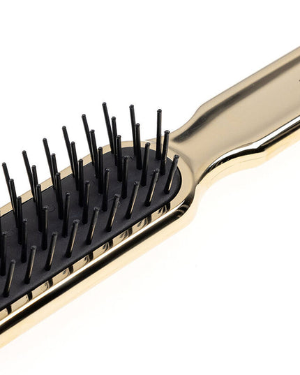 Artfully designed, our Metallic synthetic pin brushes are designed specifically for hair that’s harder to style. Increased control and manageability without damage, each is hand made with a cushioned, pneumatic rubber base. The pneumatic brush design includes cylindrical synthetic pins inserted in a unique rubber cushion pad, perfect for smoothing thick, coarse hair. Made of ABS and coated with either gold or chrome plating. Hand-crafted with the finest materials in Italy.