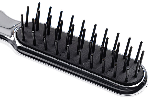 Artfully designed, our Metallic synthetic pin brushes are designed specifically for hair that’s harder to style. Increased control and manageability without damage, each is hand made with a cushioned, pneumatic rubber base. The pneumatic brush design includes cylindrical synthetic pins inserted in a unique rubber cushion pad, perfect for smoothing thick, coarse hair. Made of ABS and coated with either gold or chrome plating. Hand-crafted with the finest materials in Italy.