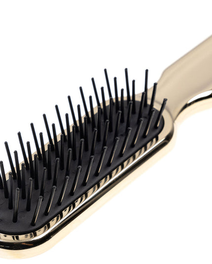 Artfully designed, our Metallic synthetic pin brushes are designed specifically for hair that’s harder to style. Increased control and manageability without damage, each is hand made with a cushioned, pneumatic rubber base. The pneumatic brush design includes cylindrical synthetic pins inserted in a unique rubber cushion pad, perfect for smoothing thick, coarse hair. Made of ABS and coated with either gold or chrome plating. Hand-crafted with the finest materials in Italy.