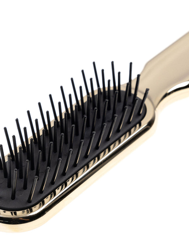 Artfully designed, our Metallic synthetic pin brushes are designed specifically for hair that’s harder to style. Increased control and manageability without damage, each is hand made with a cushioned, pneumatic rubber base. The pneumatic brush design includes cylindrical synthetic pins inserted in a unique rubber cushion pad, perfect for smoothing thick, coarse hair. Made of ABS and coated with either gold or chrome plating. Hand-crafted with the finest materials in Italy.