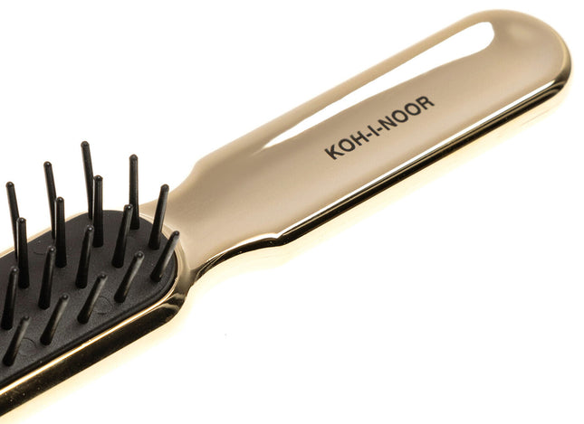 Artfully designed, our Metallic synthetic pin brushes are designed specifically for hair that’s harder to style. Increased control and manageability without damage, each is hand made with a cushioned, pneumatic rubber base. The pneumatic brush design includes cylindrical synthetic pins inserted in a unique rubber cushion pad, perfect for smoothing thick, coarse hair. Made of ABS and coated with either gold or chrome plating. Hand-crafted with the finest materials in Italy.