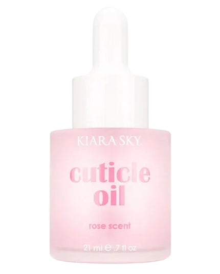 Kiara Sky Rose Scented Cuticle Oil is a professional-grade formula designed to hydrate and condition cuticles during and after salon services. Infused with vitamin E, sweet almond oil, and jojoba oil, this cuticle oil helps replenish moisture lost through chemical or mechanical nail treatments, leaving the nail bed and surrounding skin soft and resilient. Its light rose fragrance provides a clean, refreshing finish without overpowering the service environment. The 0.7 fl oz size is ideal for workstation use