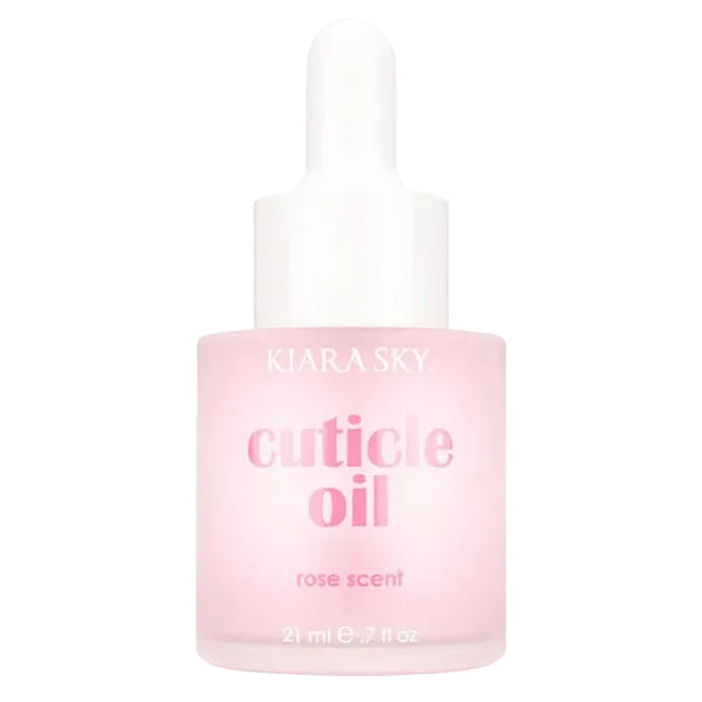 Kiara Sky Rose Scented Cuticle Oil is a professional-grade formula designed to hydrate and condition cuticles during and after salon services. Infused with vitamin E, sweet almond oil, and jojoba oil, this cuticle oil helps replenish moisture lost through chemical or mechanical nail treatments, leaving the nail bed and surrounding skin soft and resilient. Its light rose fragrance provides a clean, refreshing finish without overpowering the service environment. The 0.7 fl oz size is ideal for workstation use