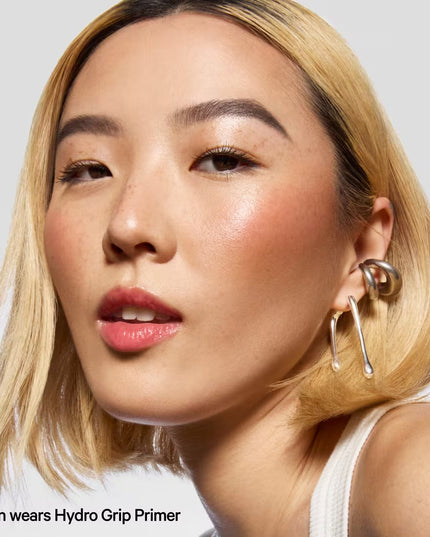 Milk Makeup's 13x award-winning Hydro Grip Primer is a 12-hour gel makeup primer that hydrates with hyaluronic acid and niacinamide for a dewy finish.
