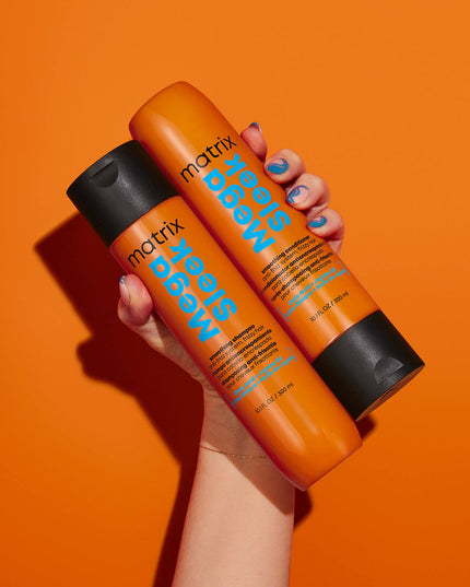 Mega Sleek Shampoo is formulated with Shea Butter to reduce frizz, smooth hair and provide humidity protection for clients with the most rebellious, unruly hair. Smoothing Shampoo. Cleanses hair and controls frizz. Protects hair against humidity.