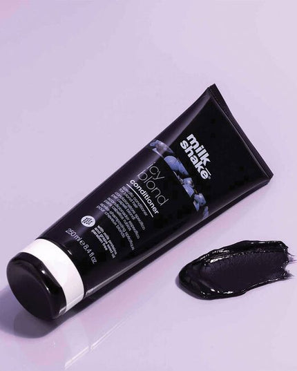 Restore light blonde hair with color-depositing milk_shake icy blond conditioner. Gone are the days of purple conditioner for blonde hair. This paraben-free conditioner has a unique black pigment that reduces brassiness &amp; enhances cool tones for intensely icy blonde hair. Added milk proteins also provide deep conditioning for softer, stronger hair after every wash. For best results, use icy blond shampoo prior to conditioning.