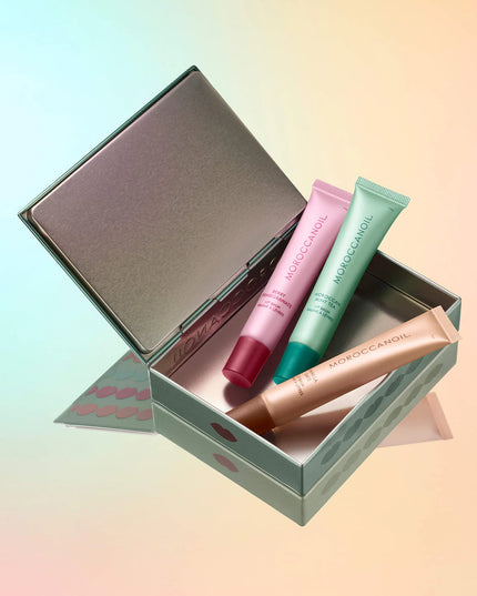 A limited-edition bundle featuring all three flavors of Moroccanoil’s hydrating Argan Butter Lip Balm.