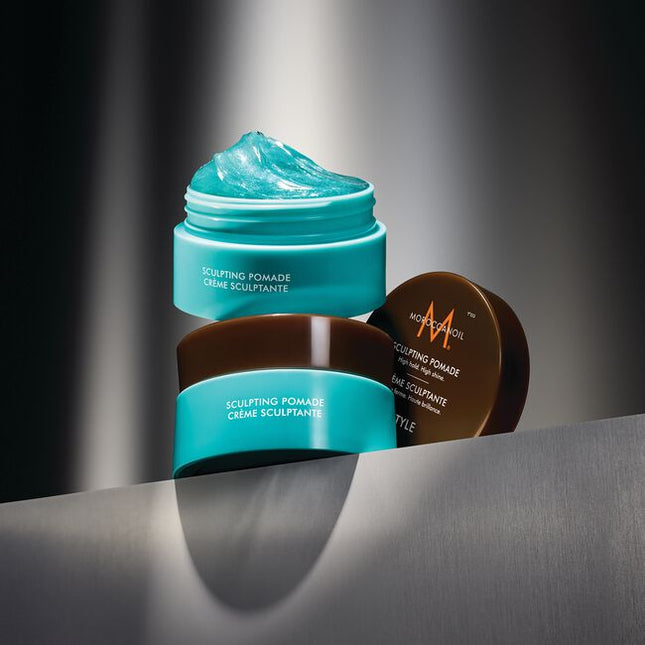 Moroccanoil Sculpting Pomade is a classic pomade that helps create timeless styles with a strong hold. Ideal for pompadours or smooth side parts and perfect for creating trending slicked-back styles on long or short hair. It provides a sleek, highshine finish that adds polish to any hairstyle. Offering an optimal balance of control and flexibility, this hydrating styler keeps your hair in place all day without feeling stiff or greasy.