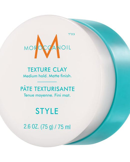 A workable clay that defines and sculpts to create natural looks with a matte finish and medium hold. Featuring a blend of argan oil, shea butter, and bentonite clay for piecey, roughed-up styles. Achieve customizable versatility—this styler allows you to build up the desired level of texture with application and the freedom to re-shape throughout the day. Moroccanoil Texture Clay controls frizz all day and leaves hair with a non-sticky, non-greasy finish.