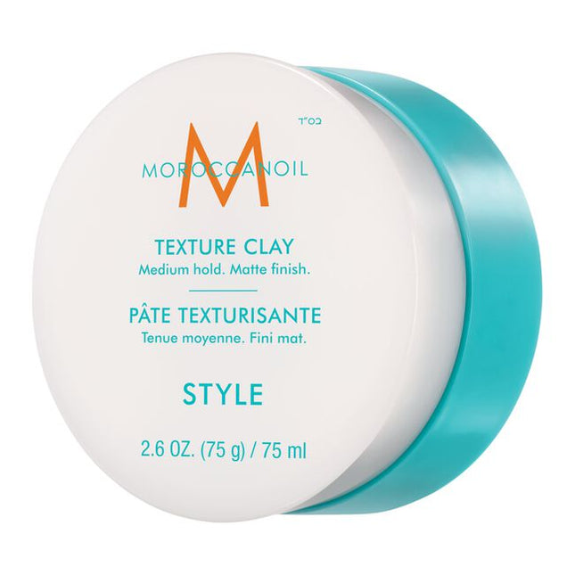 A workable clay that defines and sculpts to create natural looks with a matte finish and medium hold. Featuring a blend of argan oil, shea butter, and bentonite clay for piecey, roughed-up styles. Achieve customizable versatility—this styler allows you to build up the desired level of texture with application and the freedom to re-shape throughout the day. Moroccanoil Texture Clay controls frizz all day and leaves hair with a non-sticky, non-greasy finish.