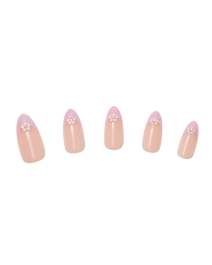 Like daydreams of Paris, Floral Reverie sweeps you away to a world of soft elegance and effortless charm. Blended pastel swirls on classic French tips mimic the watercolor skies over the Seine at dawn, while dainty floral accents add a touch of je ne sais quoi. The medium almond shape offers a refined silhouette, and the glossy finish captures the light like a Parisian café window on a sunny morning.