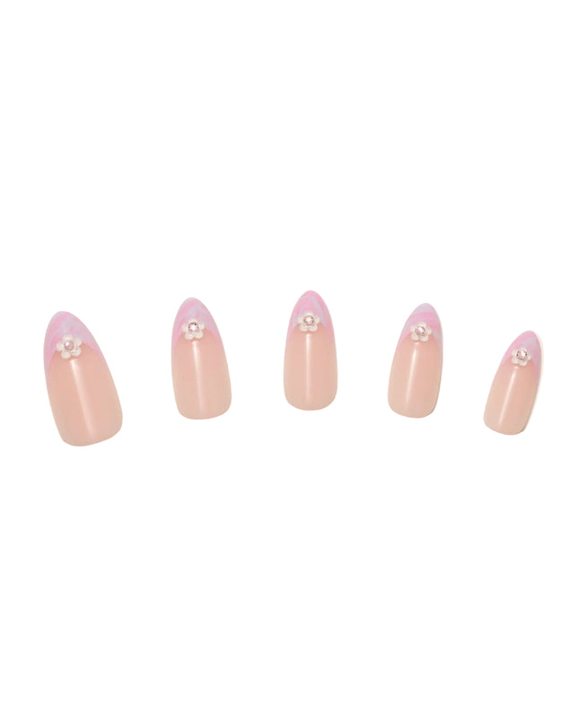 Like daydreams of Paris, Floral Reverie sweeps you away to a world of soft elegance and effortless charm. Blended pastel swirls on classic French tips mimic the watercolor skies over the Seine at dawn, while dainty floral accents add a touch of je ne sais quoi. The medium almond shape offers a refined silhouette, and the glossy finish captures the light like a Parisian café window on a sunny morning.