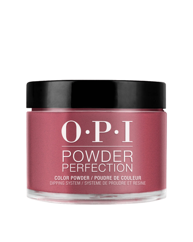 This racy red-violet dipping powder could be your vice.

Nail Powder Perfection is a quick applying, odor-free acrylic alternative that promotes a clean-air environment while offering gel-like shine. Roll up the sleeves of your blazer to show off this shade of pink-red. This dark pink shade of nail polish goes perfectly with hot Miami sunsets.