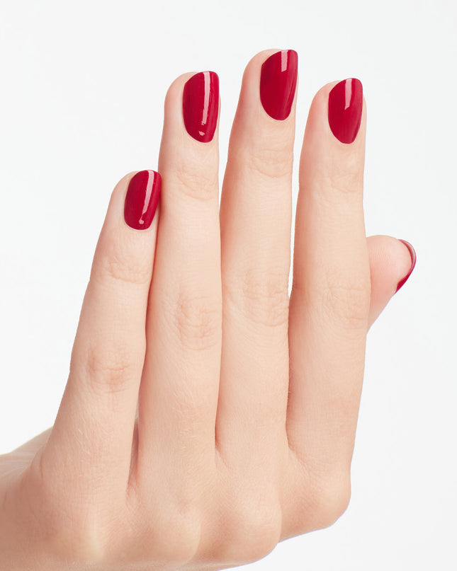 This racy red-violet dipping powder could be your vice.

Nail Powder Perfection is a quick applying, odor-free acrylic alternative that promotes a clean-air environment while offering gel-like shine. Roll up the sleeves of your blazer to show off this shade of pink-red. This dark pink shade of nail polish goes perfectly with hot Miami sunsets.