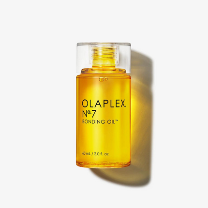 A highly-concentrated, weightless reparative styling oil that dramatically increases shine, softness, and color vibrancy. No. 7 minimizes flyaways and frizz, while providing UV/heat protection of up to 450º F/232º C.