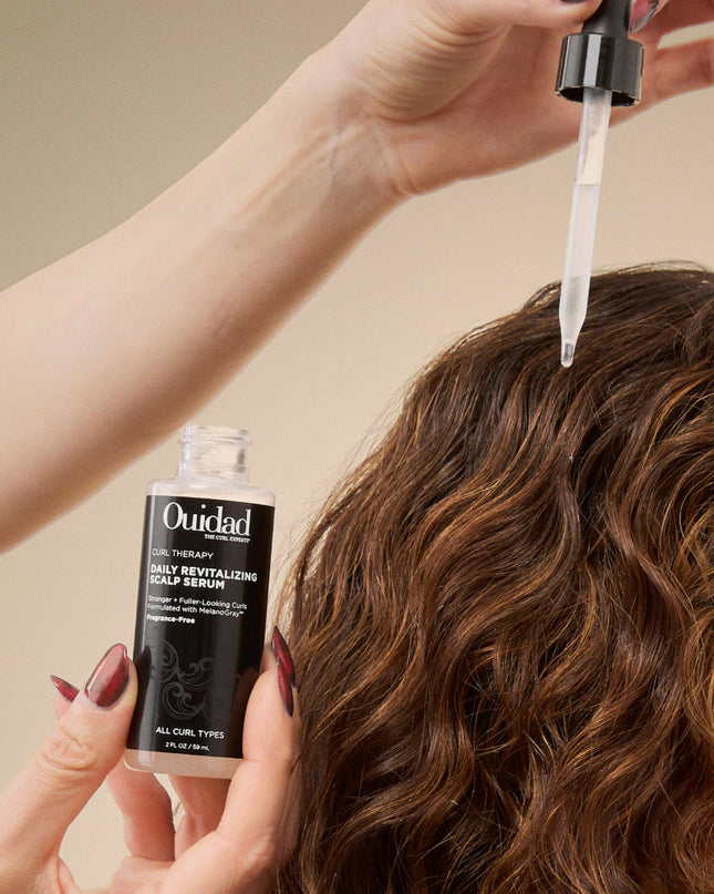 A lightweight, collagen-infused scalp serum designed to revitalize and nourish the scalp while promoting a healthy foundation for curls.