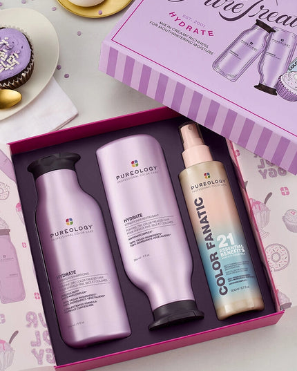 Indulge in salon-quality hydration with the Pureology Hydrate Holiday Kit, featuring Hydrate Shampoo, Hydrate Conditioner, and Color Fanatic Leave-In Treatment.