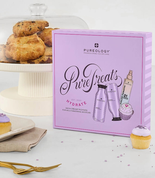 Indulge in salon-quality hydration with the Pureology Hydrate Holiday Kit, featuring Hydrate Shampoo, Hydrate Conditioner, and Color Fanatic Leave-In Treatment.