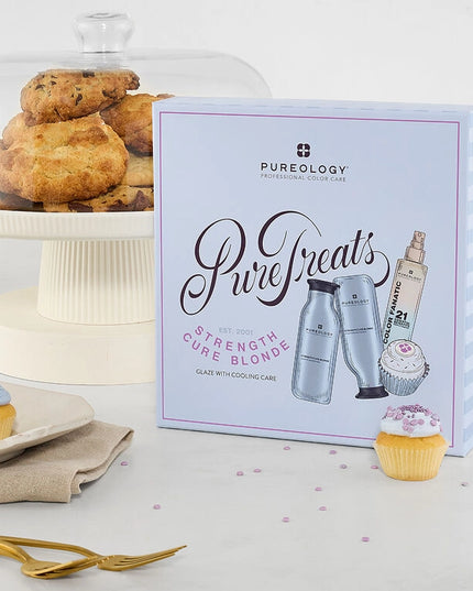 The Pureology Strength Cure Blonde Holiday Kit is a must-have for lightened hair, helping to neutralize brassy tones while repairing damage and preventing future breakage.