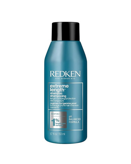 Shampoo with Redken's Length Care Complex featuring Biotin for damaged hair seeking length and strength.