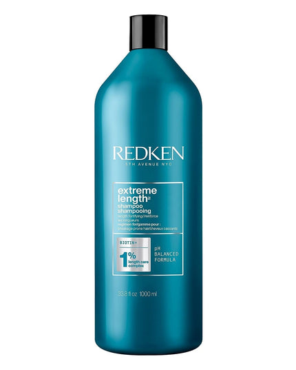 Shampoo with Redken's Length Care Complex featuring Biotin for damaged hair seeking length and strength.