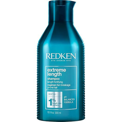 Shampoo with Redken's Length Care Complex featuring Biotin for damaged hair seeking length and strength.