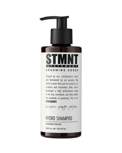 Raise your care-game with the STMNT Hydro Shampoo: A hydrating hair, scalp and beard wash designed to not only cleanse and remove product buildup but also leave hair and scalp feeling moisturized and healthy all day long. The high-performing hydrating formula with caring and balancing ingredients like allantoin and panthenol cleanses gently but effectively, creating the perfect base for a STMNT making cut and styling. Even for clients with dry hair or delicate scalp.