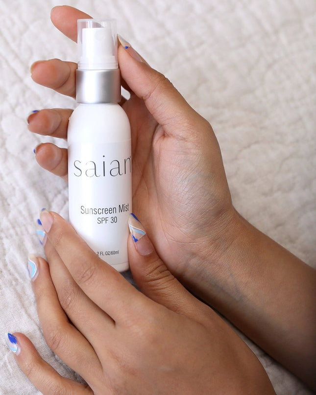 Saian Gentle Sunscreen Mist is a broad-spectrum facial sunscreen designed specifically for sensitive and acne-prone skin. Lightweight and non-comedogenic, this alcohol-free spray shields the skin with SPF 30 protection, while delivering hydration and soothing botanicals that won’t clog pores or cause irritation. Formulated with Hyaluronic Acid to replenish moisture and Vitamin E to neutralize free radicals, it also features a calming blend of Chamomile, Aloe Vera, and Calendula—making it the ideal SPF 