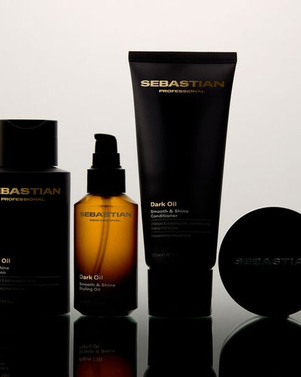 Sebastian Professional Dark Oil Silky Shine Shampoo, a revitalizing shampoo that creates silky shine and weightless body. This shampoo leaves hair with a mesmerizing fragrance and loves on every strand of your hair. Dark Oil Shampoo—part of the Dark Oil routine that loves all hair types.