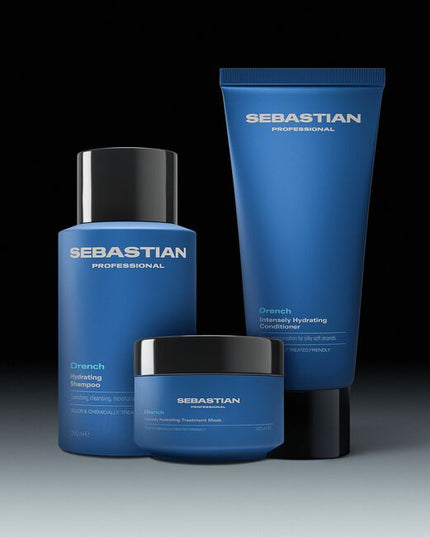 Sebastian Professional Drench Intensely Hydrating Conditioner, a deeply moisturizing conditioner that loves dry, thirsty hair. The intensely hydrating formula drenches and detangles to calm frizz and revive softness. Suitable for colored and chemically treated hair.